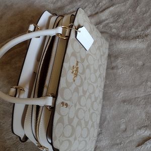 Lillie Carryall in signature canvas